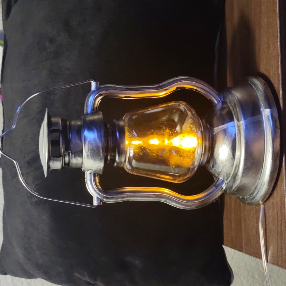 Silver tone plastic lantern for indoor use